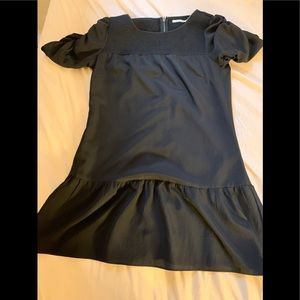 Cute black flirty dress very forgiving